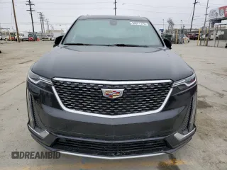 2023 Cadillac XT6 FWD Premium Luxury z VIN 1GYKPCRS5PZ119186, wystawiony jako Copart lot #50577175 z przebiegiem 32 189 mil mil oraz Szkoda całkowita • Salvage title. Historia ofert i sprzedaży dostępna na DreamBid. Obrazek 5.