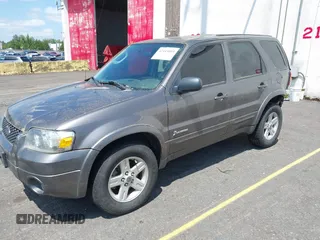 2006 Ford Escape Hybrid z VIN 1FMCU96H86KA52519, wystawiony jako IAAI lot #42443003 z przebiegiem 162 469 mil mil oraz . Historia ofert i sprzedaży dostępna na DreamBid. Obrazek 2.