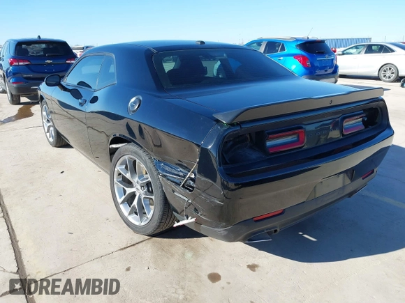 2020 Dodge Challenger SXT with VIN 2C3CDZAG1LH178618, listed as a IAAI auction lot 41654383 with 48,744 mi miles and . Bid and sale history available at DreamBid. Image 3.