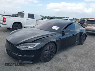 2023 Tesla Model S with VIN 5YJSA1E53PF510757, listed as a IAAI auction lot 42075624 with Not provided miles and . Bid and sale history available at DreamBid. Image 18.