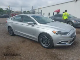 2017 Ford Fusion Hybrid Titanium с VIN 3FA6P0RU3HR188204, выставлен на аукционе IAAI как лот 42618604 с пробегом 104 609 миль миль и . История ставок и продаж доступна на DreamBid. Изображение 1.