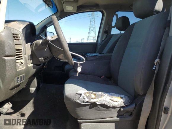2005 Nissan Titan XE with VIN 1N6AA07AX5N564617, listed as a Copart auction lot 71100924 with 259,082 mi miles and Salvage Title. Bid and sale history available at DreamBid. Image 7.