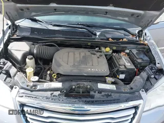 2013 Chrysler Town & Country Limited with VIN 2C4RC1GGXDR548106, listed as a IAAI auction lot 41890220 with 189,908 mi miles. Bid and sale history available at carsss.com. Image 10.
