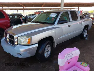 2007 Dodge Dakota SLT with VIN 1D7HE48N57S171908, listed as a IAAI auction lot 41875045 with 245,148 mi miles and . Bid and sale history available at carsss.com. Image 2.