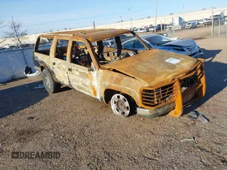 1997 GMC Suburban with VIN 1GKFK16R0VJ736393, listed as a IAAI auction lot 40838213 with 1 mi miles. Bid and sale history available at carsss.com. Image 1.