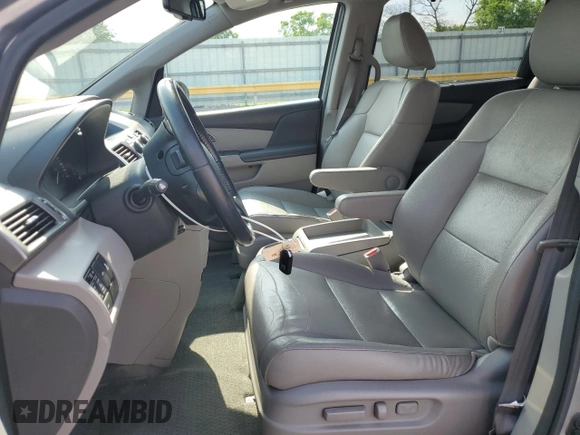 2016 Honda Odyssey EX-L with VIN 5FNRL5H66GB132308, listed as a Copart auction lot 55299495 with 143,174 mi miles and Salvage Title. Bid and sale history available at DreamBid. Image 7.