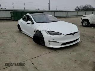 2021 Tesla Model S Plaid с VIN 5YJSA1E6XMF455258, выставлен на аукционе Copart как лот 43788675 с пробегом Не указан миль и Списание • Salvage title. История ставок и продаж доступна на DreamBid. Изображение 11.