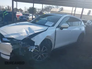 2017 Mazda CX-5 Grand Touring with VIN JM3KFBDL6H0164993, listed as a IAAI auction lot 41450556 with 97,733 mi miles. Bid and sale history available at carsss.com. Image 14.