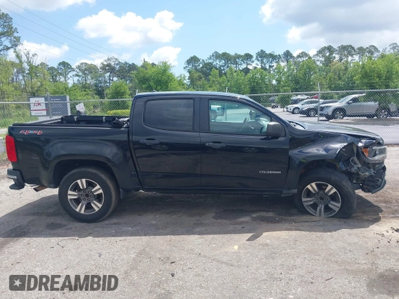 2018 Chevrolet Colorado 4WD Work Truck z VIN 1GCGTBEN9J1206595, wystawiony jako IAAI lot #42150736 z przebiegiem 176 880 mil mil oraz . Historia ofert i sprzedaży dostępna na DreamBid. Obrazek 13.