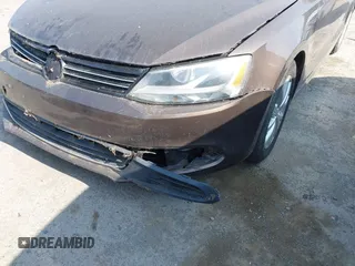 2014 Volkswagen Jetta SE with VIN 3VWD17AJ7EM385606, listed as a IAAI auction lot 42575046 with 86,889 mi miles and . Bid and sale history available at DreamBid. Image 6.
