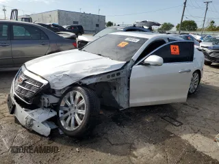 2018 Cadillac ATS Luxury RWD z VIN 1G6AB5SX8J0128917, wystawiony jako Copart lot #73596104 z przebiegiem Nie podano mil oraz Szkoda całkowita • Salvage title. Historia ofert i sprzedaży dostępna na DreamBid. Obrazek 1.