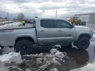 2021 Toyota Tacoma SR z VIN 3TMCZ5AN0MM386867, wystawiony jako IAAI lot #41580426 z przebiegiem 46 559 mil mil oraz . Historia ofert i sprzedaży dostępna na DreamBid. Obrazek 13.