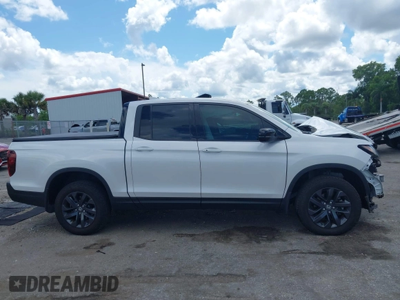 2024 Honda Ridgeline Sport with VIN 5FPYK3F14RB011166, listed as a IAAI auction lot 42591313 with 5,175 mi miles and . Bid and sale history available at DreamBid. Image 13.