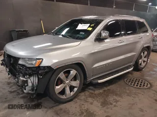 2015 Jeep Grand Cherokee Overland with VIN 1C4RJFCG1FC215426, listed as a IAAI auction lot 41689821 with 128,563 mi miles. Bid and sale history available at carsss.com. Image 18.
