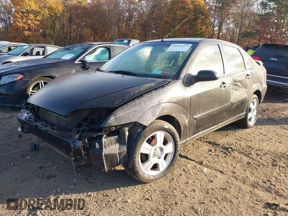 2007 Ford Focus S z VIN 1FAHP34N07W360761, wystawiony jako IAAI lot #40754946 z przebiegiem 121 371 mil mil oraz . Historia ofert i sprzedaży dostępna na DreamBid. Obrazek 2.