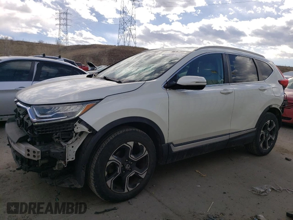2018 Honda CR-V Touring with VIN 5J6RW2H95JL030237, listed as a Copart auction lot 44001415 with 55,575 mi miles and Salvage Title. Bid and sale history available at DreamBid. Image 1.