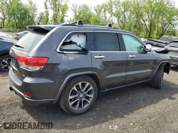 2017 Jeep Grand Cherokee Overland z VIN 1C4RJFCG2HC913434, wystawiony jako Copart lot #56580955 z przebiegiem 86 358 mil mil oraz Szkoda całkowita • Salvage title. Historia ofert i sprzedaży dostępna na DreamBid. Obrazek 3.