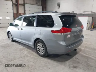 2013 Toyota Sienna XLE AAS with VIN 5TDYK3DC5DS363822, listed as a IAAI auction lot 42019598 with 74,508 mi miles. Bid and sale history available at carsss.com. Image 3.