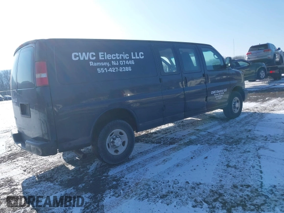 2014 Chevrolet Express Cargo Van with VIN 1GCWGGBA5E1205786, listed as a IAAI auction lot 41339085 with 201,460 mi miles. Bid and sale history available at carsss.com. Image 4.