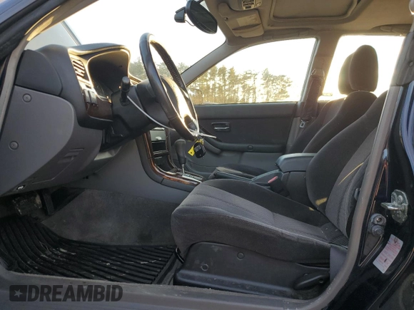 2003 Subaru Legacy L with VIN 4S3BE635937210774, listed as a Copart auction lot 84032224 with 154,156 mi miles and Clean title. Bid and sale history available at DreamBid. Image 7.