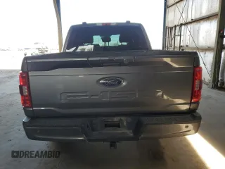 2021 Ford F-150 XL with VIN 1FTEW1C58MFB54623, listed as a Copart auction lot 55072405 with 115,374 mi miles and Salvage title. Bid and sale history available at DreamBid. Image 6.