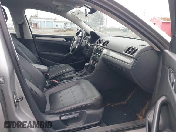2014 Volkswagen Passat Wolfsburg Edition with VIN 1VWAT7A33EC060225, listed as a IAAI auction lot 41818949 with 163,545 mi miles and . Bid and sale history available at DreamBid. Image 5.