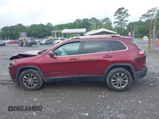 2019 Jeep Cherokee Latitude Plus with VIN 1C4PJMLB3KD195412, listed as a IAAI auction lot 42117860 with 177,178 mi miles. Bid and sale history available at carsss.com. Image 14.
