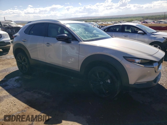2022 Mazda CX-30 2.5 Turbo with VIN 3MVDMBAY1NM447753, listed as a Copart auction lot 68148334 with 5,180 mi miles and Salvage Title. Bid and sale history available at DreamBid. Image 4.