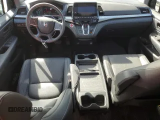 2023 Honda Odyssey EX-L with VIN 5FNRL6H67PB057737, listed as a Copart auction lot 53464695 with 21,144 mi miles and Salvage Title. Bid and sale history available at DreamBid. Image 8.