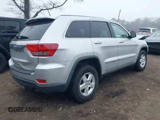 2013 Jeep Grand Cherokee Laredo with VIN 1C4RJFAGXDC537367, listed as a IAAI auction lot 41906921 with 124,679 mi miles. Bid and sale history available at carsss.com. Image 4.