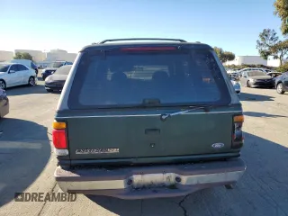 1996 Ford Explorer XL z VIN 1FMDU34X0TUC31973, wystawiony jako Copart lot #87892655 z przebiegiem 142 774 mil mil oraz Tytuł czysty. Historia ofert i sprzedaży dostępna na DreamBid. Obrazek 6.
