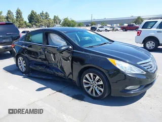 2012 Hyundai Sonata SE z VIN 5NPEC4AC6CH387870, wystawiony jako IAAI lot #42399483 z przebiegiem 151 289 mil mil oraz . Historia ofert i sprzedaży dostępna na DreamBid. Obrazek 1.