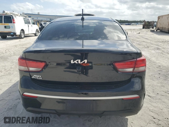 2023 Kia Rio S with VIN 3KPA24AD7PE592716, listed as a Copart auction lot 47929405 with 24,605 mi miles and Non Repairable. Bid and sale history available at carsss.com. Image 6.