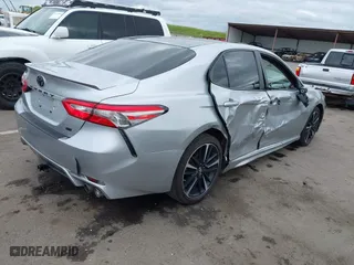2018 Toyota Camry LE with VIN 4T1B11HK0JU129623, listed as a IAAI auction lot 41902335 with 100,643 mi miles. Bid and sale history available at carsss.com. Image 4.