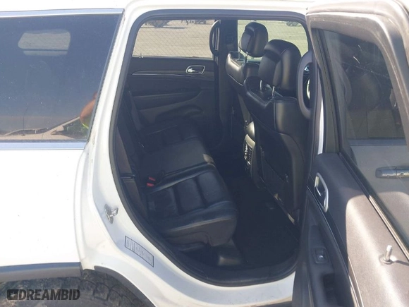 2019 Jeep Grand Cherokee Limited with VIN 1C4RJFBG3KC734697, listed as a IAAI auction lot 41645913 with 128,419 mi miles. Bid and sale history available at carsss.com. Image 8.