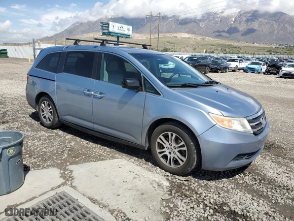 2012 Honda Odyssey EX-L with VIN 5FNRL5H6XCB041293, listed as a Copart auction lot 51707715 with 147,322 mi miles and Salvage Title. Bid and sale history available at carsss.com. Image 4.