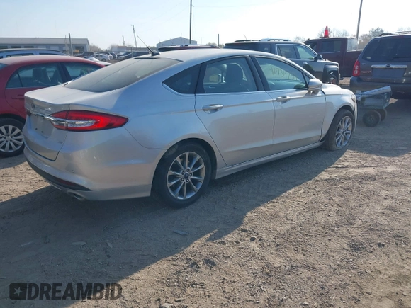 2017 Ford Fusion SE z VIN 3FA6P0H73HR236618, wystawiony jako IAAI lot #40734739 z przebiegiem 189 000 mil mil oraz . Historia ofert i sprzedaży dostępna na DreamBid. Obrazek 4.