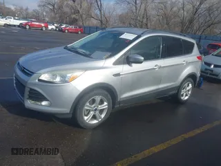 2014 Ford Escape SE with VIN 1FMCU9GX9EUB98758, listed as a IAAI auction lot 41717257 with 126,358 mi miles. Bid and sale history available at carsss.com. Image 2.