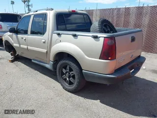 2004 Ford Explorer Sport Trac XLS with VIN 1FMZU67K94UA65509, listed as a IAAI auction lot 41945507 with 183,463 mi miles. Bid and sale history available at carsss.com. Image 3.