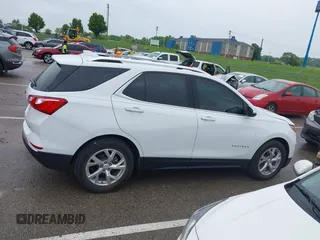 2021 Chevrolet Equinox Premier with VIN 3GNAXNEV5MS160043, listed as a IAAI auction lot 42109564 with 36,808 mi miles and . Bid and sale history available at DreamBid. Image 13.