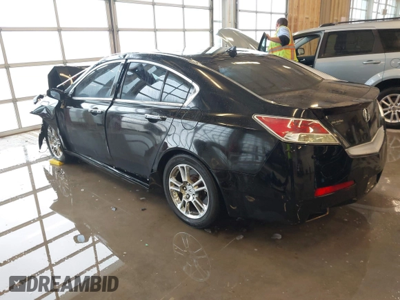 2009 Acura TL Tech with VIN 19UUA86549A010863, listed as a IAAI auction lot 41001252 with 186,441 mi miles. Bid and sale history available at carsss.com. Image 3.
