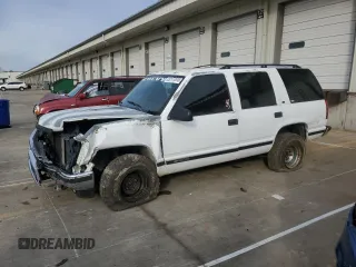 1998 Chevrolet Tahoe z VIN 1GNEK13R7WJ340188, wystawiony jako Copart lot #52177815 z przebiegiem 217 850 mil mil oraz Szkody całkowita. Historia ofert i sprzedaży dostępna na DreamBid. Obrazek 1.