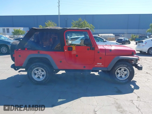 2005 Jeep Wrangler Unlimited with VIN 1J4FA44S65P324248, listed as a IAAI auction lot 42235190 with 86,971 mi miles and . Bid and sale history available at DreamBid. Image 13.