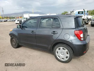 2010 Scion xD with VIN JTKKU4B48AJ052808, listed as a Copart auction lot 86248184 with 97,564 mi miles and Salvage Title. Bid and sale history available at carsss.com. Image 2.