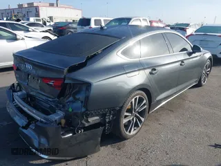 2023 Audi S5 Sportback Premium Plus z VIN WAUC4CF55PA001605, wystawiony jako IAAI lot #41597900 z przebiegiem 24 446 mil mil oraz . Historia ofert i sprzedaży dostępna na DreamBid. Obrazek 4.