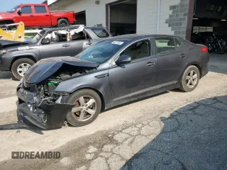 2015 Kia Optima LX z VIN KNAGM4A72F5623845, wystawiony jako Copart lot #60070945 z przebiegiem 142 855 mil mil oraz Szkoda całkowita • Salvage title. Historia ofert i sprzedaży dostępna na DreamBid. Obrazek 1.
