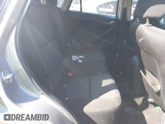 2013 Mazda CX-5 Sport z VIN JM3KE2BE9D0132928, wystawiony jako IAAI lot #41997589 z przebiegiem Nie podano mil oraz . Historia ofert i sprzedaży dostępna na DreamBid. Obrazek 8.