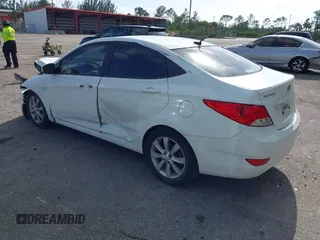 2014 Hyundai Accent GLS with VIN KMHCU4AE8EU608539, listed as a IAAI auction lot 41946784 with 106,709 mi miles and . Bid and sale history available at carsss.com. Image 3.