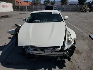 2014 Nissan 370Z Nismo with VIN JN1AZ4EH2EM633022, listed as a Copart auction lot 46947575 with 115,042 mi miles and Salvage Title. Bid and sale history available at DreamBid. Image 5.