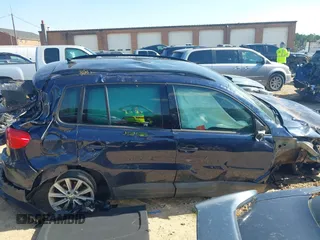 2015 Volkswagen Tiguan SE z VIN WVGBV7AX3FW583163, wystawiony jako IAAI lot #41991409 z przebiegiem 99 866 mil mil oraz . Historia ofert i sprzedaży dostępna na DreamBid. Obrazek 14.